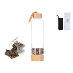 Ielādēt attēlu galerijas skatītājā, Stikla pudele ar kristāliem Ametists / Kalnu Kristāls / Obsidiāns / Rozā Kvarcs / Tīģeracs 7x24.5cm 550ml