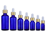 Load image into Gallery viewer, Zila stikla pudele Blue Glass Bottle Gold &amp; White 10ml-100ml

